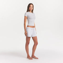 COTTON JERSEY T-SHIRT | LIGHT HEATHER GREY ON A MODEL SIDE VIEW @ | FOCUS: 0.0, 1.0, 0.9