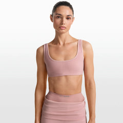 NikeSKIMS RIBBED SEAMLESS MICRO SCOOP BRA | HIMALAYAN ON A MODEL FRONT VIEW @ | FOCUS: 0.0, 1.0, 0.9