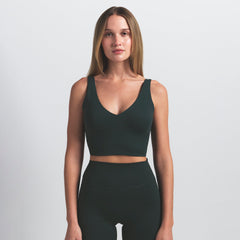NikeSKIMS MATTE V-NECK BRA TOP | DARK TEAL ON A MODEL SIDE VIEW @ | FOCUS: 0.0, 1.0, 0.9