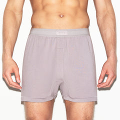 SKIMS COTTON MENS KNIT BOXER | ZINC ON A MODEL SIDE VIEW | FOCUS: 0.0, 1.0, 0.9