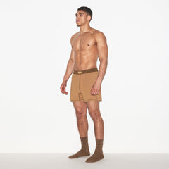 SKIMS COTTON MENS KNIT BOXER 3-PACK | RUSSET MULTI ON A MODEL FRONT VIEW | FOCUS: 0.0, 1.0, 0.9
