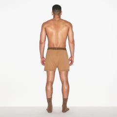 SKIMS COTTON MENS KNIT BOXER 3-PACK | RUSSET MULTI ON A MODEL FRONT VIEW | FOCUS: 0.0, 1.0, 0.9