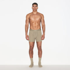 SKIMS SPORT MENS 5" BOXER BRIEF 3-PACK | DUNE MULTI ON A MODEL FRONT VIEW | FOCUS: 0.0, 1.0, 0.9