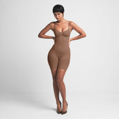 SEAMLESS SCULPT MID THIGH BODYSUIT | JASPER ON A MODEL FRONT VIEW