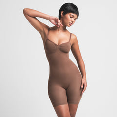 SEAMLESS SCULPT LOW BACK MID THIGH BODYSUIT | JASPER ON A MODEL FRONT VIEW
