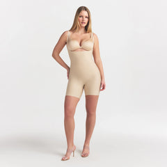 SKIMS BODY CORE SCULPT BACK SMOOTHING OPEN BUST MID THIGH BODYSUIT | SAND ON A MODEL FRONT VIEW @