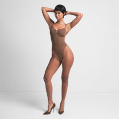 SEAMLESS SCULPT THONG BODYSUIT | JASPER ON A MODEL FRONT VIEW