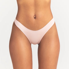 SHINE FOUNDATIONS DIPPED BIKINI | DUSTY PINK ON A MODEL FRONT VIEW @ | FOCUS: 0.0, 1.0, 0.9