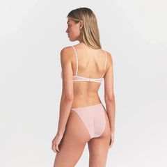 ULTRA FINE MESH STRING BIKINI | BARELY PINK ON A MODEL SIDE VIEW @ | FOCUS: 0.0, 1.0, 0.9