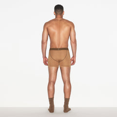 SKIMS COTTON MENS 3 INCH BOXER BRIEF 3-PACK | RUSSET MULTI ON A MODEL FRONT VIEW | FOCUS: 0.0, 1.0, 0.9