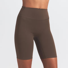 NikeSKIMS MATTE 7" BIKER SHORT | DARK SEPIA ON A MODEL FRONT VIEW