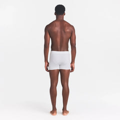SKIMS COTTON MENS 3" BOXER BRIEF | CHALK ON A MODEL BACK VIEW
