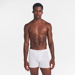 SKIMS COTTON MENS 3" BOXER BRIEF | CHALK ON A MODEL FRONT VIEW