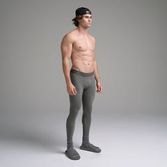 SKIMS SPORT MENS LEGGING | GUNMETAL ON A MODEL SIDE VIEW | FOCUS: 0.0, 1.0, 0.9