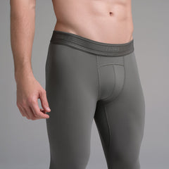 SKIMS SPORT MENS LEGGING | GUNMETAL ON A MODEL SIDE VIEW | FOCUS: 0.0, 1.0, 0.9