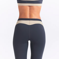 NikeSKIMS MATTE AND SHINE 26" LEGGING | DEEP ROYAL/STONE ON A MODEL SIDE VIEW @ | FOCUS: 0.0, 1.0, 0.9