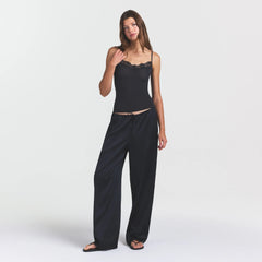 WOVEN SHINE LACE PANT | ONYX ON A MODEL FRONT VIEW @ | FOCUS: 0.0, 1.0, 0.9