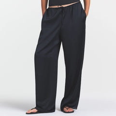 WOVEN SHINE LACE PANT | ONYX ON A MODEL SIDE VIEW @ | FOCUS: 0.0, 1.0, 0.9
