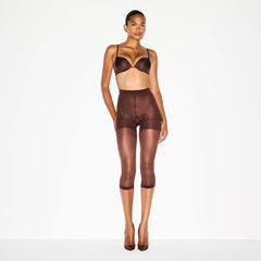 HOSIERY SHAPING CAPRI TIGHTS | COCOA ON A MODEL FRONT VIEW @