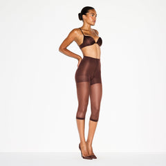 HOSIERY SHAPING CAPRI TIGHTS | COCOA ON A MODEL FRONT VIEW @