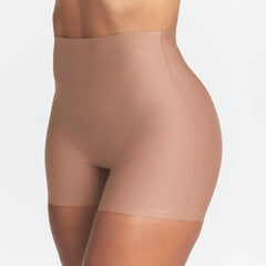 SKIMS BODY CORE SCULPT SHORTIE | SIENNA ON A MODEL SIDE VIEW @