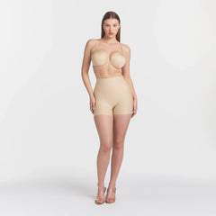 SKIMS BODY CORE SCULPT SHORTIE | SAND ON A MODEL FRONT VIEW @