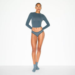 LIGHTWEIGHT COTTON POINTELLE LACE BRIEF | ZIRCON TONAL ON A MODEL FRONT VIEW @ | FOCUS: 0.0, 1.0, 0.9