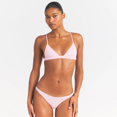 EVERYDAY COTTON TRIANGLE BRALETTE | PEONY ON A MODEL SIDE VIEW @ | FOCUS: 0.0, 1.0, 0.9