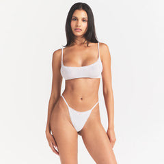 LIGHTWEIGHT COTTON POINTELLE SCOOP BRALETTE | SNOW PEONY PIN DOT ON A MODEL SIDE VIEW @ | FOCUS: 0.0, 1.0, 0.9