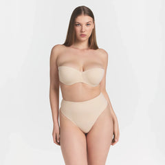 SMOOTHING INTIMATES STRAPLESS BRA | SAND ON A MODEL FRONT VIEW @ | FOCUS: 0.0, 1.0, 0.9