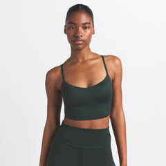 NikeSKIMS MATTE CAMI BRA TOP | DARK TEAL ON A MODEL SIDE VIEW @ | FOCUS: 0.0, 1.0, 0.9