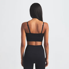 NikeSKIMS MATTE CAMI BRA TOP | OBSIDIAN ON A MODEL BACK VIEW @ | FOCUS: 0.0, 1.0, 0.9