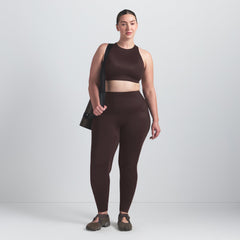 NikeSKIMS SHINE HIGH NECK BRA | PHOENIX ON A MODEL FRONT VIEW
