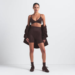 NikeSKIMS SHINE TRIANGLE BRA | PHOENIX ON A MODEL FRONT VIEW @ | FOCUS: 0.9, 0.1, 0.7