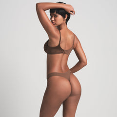 SKIMS ULTIMATE BRA IN JASPER ON A MODEL BACK VIEW | FOCUS: 0.0, 1.0, 0.9