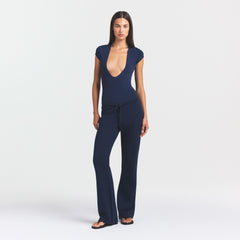 COTTON JERSEY DEEP PLUNGE BODYSUIT | NAVY ON A MODEL FRONT VIEW @ | FOCUS: 0.0, 1.0, 0.9