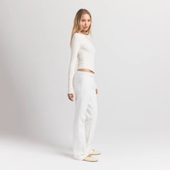 COTTON FLEECE SLIM PANT | MARBLE ON A MODEL SIDE VIEW S | FOCUS: 0.0, 1.0, 0.9