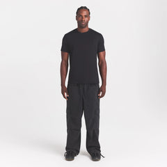 WOVEN MENS CARGO PANT | ONYX ON A MODEL FRONT VIEW @ | FOCUS: 0.0, 1.0, 0.9