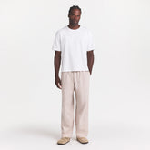 WOVEN MENS KARATE PANT | STONE ON A MODEL FRONT VIEW @ | FOCUS: 0.0, 1.0, 0.9