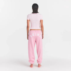 COTTON FLEECE JOGGER | HALITE WITH SNOW LOGO ON A MODEL BACK VIEW @ | FOCUS: 0.0, 1.0, 0.9