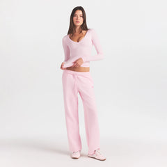 COTTON FLEECE STRAIGHT LEG PANT WITH EMBOSSED LOGO | CHERRY BLOSSOM ON A MODEL FRONT VIEW @ | FOCUS: 0.0, 1.0, 0.9