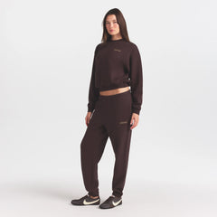 COTTON FLEECE JOGGER WITH EMBOSSED LOGO | ESPRESSO ON A MODEL FRONT VIEW @ | FOCUS: 0.0, 1.0, 0.9