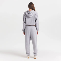 COTTON FLEECE JOGGER WITH EMBOSSED LOGO | HEATHER GREY ON A MODEL FRONT VIEW @ | FOCUS: 0.0, 1.0, 0.9