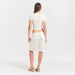 WOVEN COTTON OVERSIZED CARGO SHORT | EGRET ON A MODEL FRONT VIEW @ | FOCUS: 0.0, 1.0, 0.9