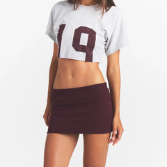 COTTON RIB FOLDOVER MINI SKIRT | CURRANT ON A MODEL | FOCUS: 0.0, 1.0, 0.9