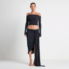 VETTESE X SKIMS SHEER MODAL DRAPED MIDI SKIRT | ONYX ON A MODEL FRONT VIEW| FOCUS: 0.0, 1.0, 0.9