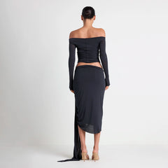 VETTESE X SKIMS SHEER MODAL DRAPED MIDI SKIRT | ONYX ON A MODEL BACK VIEW| FOCUS: 0.0, 1.0, 0.9
