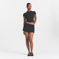 NikeSKIMS AIRY FOLDOVER SKORT | NSKM OBSIDIAN ON A MODEL