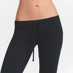NikeSKIMS AIRY LOW RISE MINI FLARE PANT | NSKM OBSIDIAN ON A MODEL