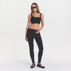 NikeSKIMS MATTE CORSET LONGLINE BRA | OBSIDIAN ON A MODEL